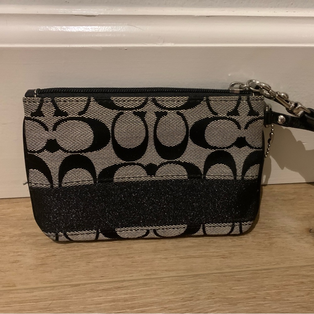 Small Coach wristlet.